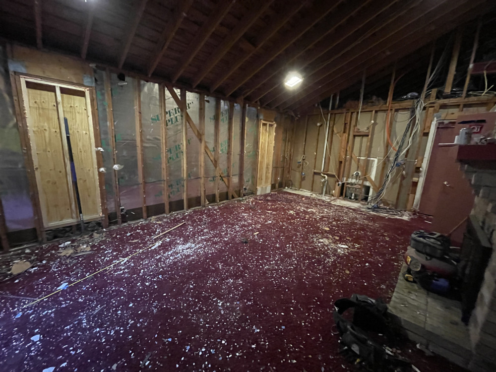 Removing old theater room to the studs